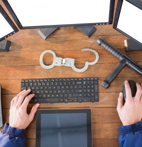 hands-of-security-officer-using-computer.jpg